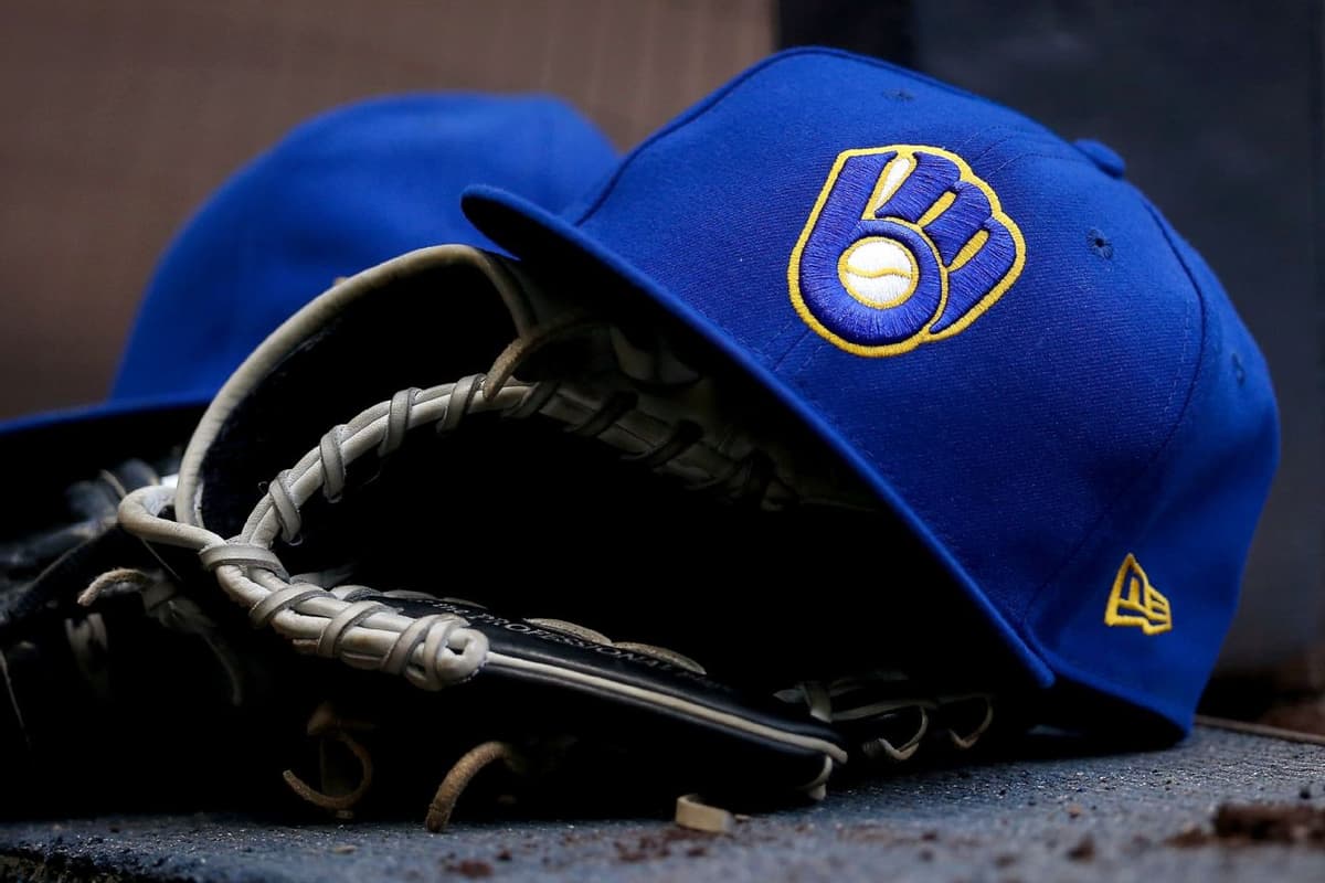 Brewers Roster Shakeup: DL Hall Placed on Injured List as Jake Woodford Designated for Assignment