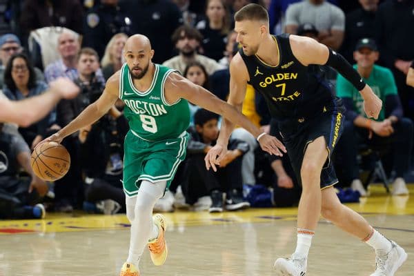 Kristaps Porzingis Warriors Debut: 12 Points and a Spark in Loss to Celtics