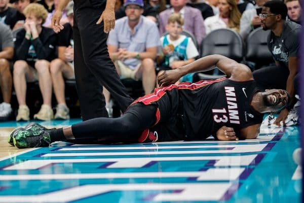 Heat's Bam Adebayo Sidelined with Lower Back Injury After Collision with LaMelo Ball