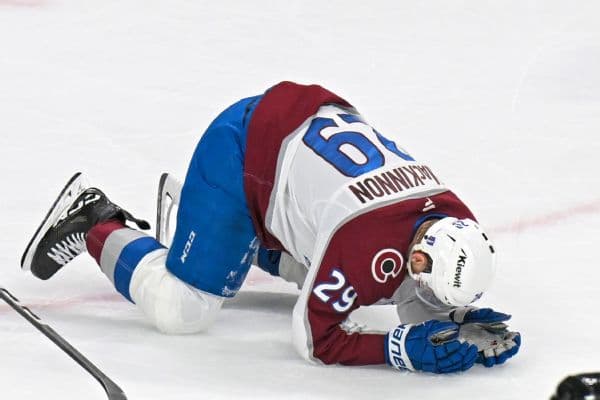 Nathan MacKinnon Bloodied by Teammate's Puck: Avalanche Star Returns in Game 4
