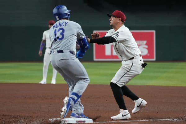 Ildemaro Vargas and Max Muncy Forced Out of Game Following Violent Collision at First Base