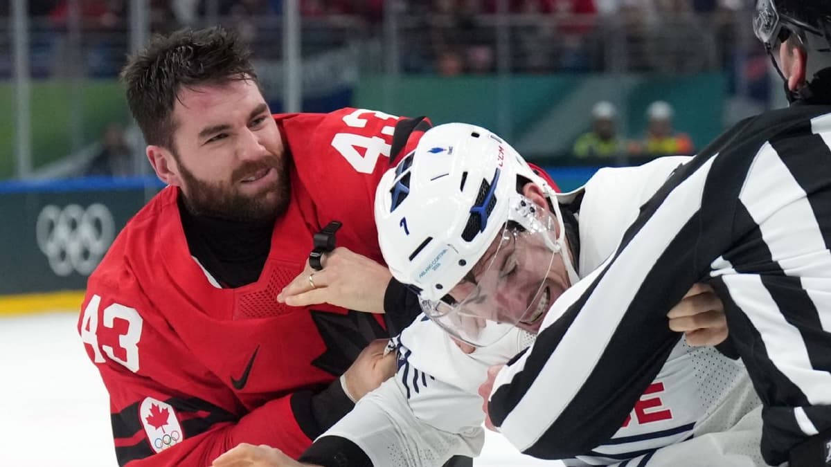 Tom Wilson Defends Nathan MacKinnon with Rare Olympic Hockey Fight Against France